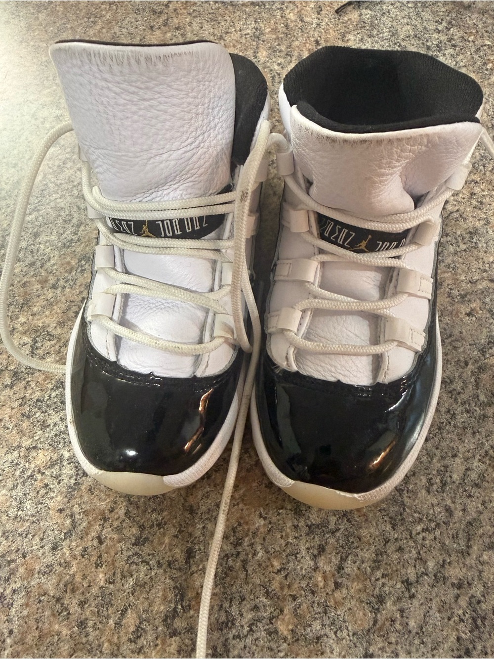 Jordan Kids Black and White High-Top Sneakers
